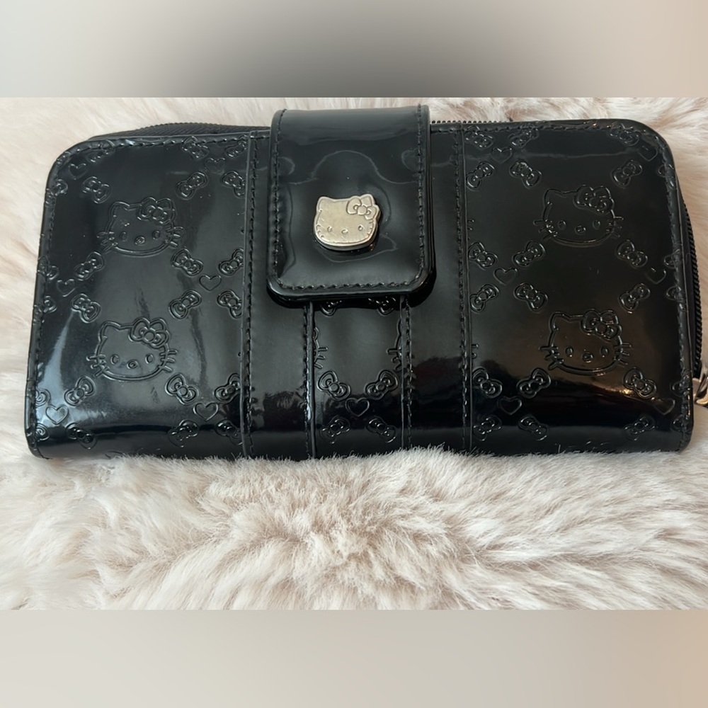 Loungefly Sanrio Hello Kitty patent leather embossed zip wallet.
